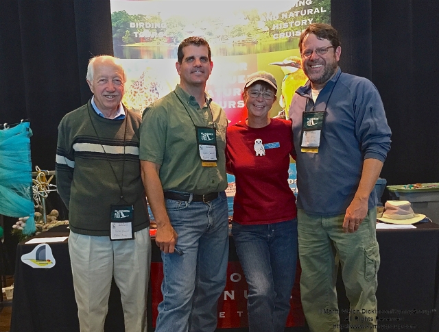 L. to R. Victor Emanuel, Barry Lyons, Louise Zemaitis & Michael O'Brien of VENT & CMFBF Exhibitors, Cape May Fall Birding Festival Trade Show, Convention Hall, Cape May, NJ. ©Mardi Welch Dickinson All Rights Reserved.