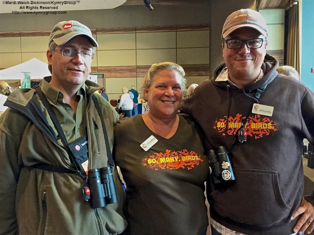 L. to R. Jeff Bouton, Marketing Manager, Leica Sport Optics USA & CMFF Exhibitor; Lillian Armstrong, Special Events Coordinator, CMBO; David La Puma, CMBO Director. Cape May Fall Birding Festival Trade Show Convention Hall, Cape May, NJ. ©Mardi Welch Dickinson All Rights Reserved.